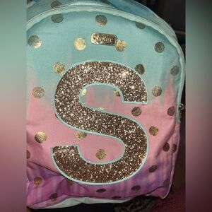S initial Justice backpack like new